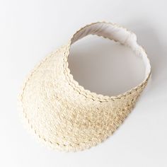 Keep the sun off your face this summer with a handwoven visor made by artisans in Bali! Great for beach or pool days with a braid or messy bun. Ethically made/Eco-friendly Made with palm leaves Elastic band One size fits most 11"x9" Adjustable Open Weave Sun Hat In Toquilla Straw, Natural Woven Sun Hat For Beach Season, Lightweight Natural Straw Hat For Sunbathing, Beach Season Natural Woven Sun Hat, Adjustable Lightweight Sun Hat For Poolside, Lightweight Adjustable Sun Hat For Poolside, Bohemian Adjustable Lightweight Straw Hat, Adjustable Sun Hat With Open Weave And Curved Brim, Natural Woven Sun Hat For Vacation