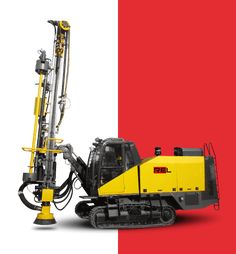 a yellow and black machine is next to a red and white background with an orange stripe