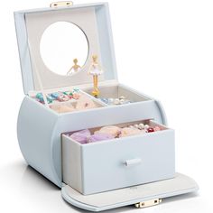 an open jewelry box on a white background