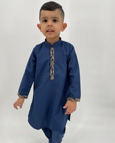 WE HAVE RECENTLY REORGANIZED OUR SHOP. PLEASE SEE OUR ETSY SHOP PAGE FOR ADDITIONAL COLOR KURTAS IN THIS DESIGN. Adorable, made-to-order kurta for infant, toddler and kid boys! Kurta ➤ Breathable and easy-to-wash cotton fabric ➤ Easy open and close clasp-buttons ➤ No-itch collar and sleeves ➤ Wide neck to easily fit over baby's head ➤ Options for plain or decorative sleeves and neckline Pajama / Pant / Trouser ➤ Breathable and easy-to-wash cotton fabric ➤ White to match with several kotis, kurta Blue Kurta With Traditional Patterns For Ceremonies, Traditional Churidar With Dori Work For Ceremonies, Traditional Lawn Suit With Dori Work For Festivals, Blue Kurta For Eid And Traditional Ceremonies, Festive Lawn Suit With Dori Work For Diwali, Traditional Blue Kurta For Ceremonial Occasions, Blue Salwar Kameez With Traditional Patterns For Eid, Blue Traditional Salwar Kameez For Eid, Bollywood Style Kurta With Dabka For Traditional Ceremonies