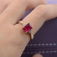 Ruby ring yellow gold engagement ring emerald cut ring gold | Etsy Ring Types, Ruby Ring Designs, Ruby Engagement Ring Vintage, Silver Ruby Ring, Ruby Ring Vintage, Engagement Ring Yellow Gold, Golden Diamond, Jewelry Ruby, July Birthstone Ring