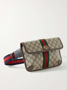 Gucci's 'Ophidia' belt bag has been crafted in Italy from monogrammed coated-canvas in classic shades of brown. Detailed with a gold emblem, it's trimmed with durable full-grain leather and signature striped webbing. Gucci Leather Shoulder Bag With Logo Strap, Luxury Shoulder Bag With Logo Strap In Coated Canvas, Designer Gucci Bag With Logo Strap, Gucci Designer Bag With Logo Strap, Gucci Luxury Bag With Logo Strap, Luxury Gucci Bag With Logo Strap, Gucci Rectangular Bag With Logo Strap, Designer Brown Bags With Logo Strap, Designer Travel Bag With Removable Belt