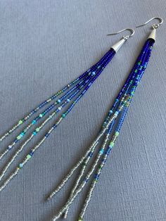 Silver and Blue Seed Beads 4 6 and 9 - Etsy Blue Multi-strand Jewelry With Dangling Beads, Bohemian Blue Beaded Earrings With Silver Beads, Blue Beaded Earrings With Dangling Round Beads, Blue Beaded Dangle Necklace With Large Beads, Blue Large Beads Dangle Necklace, Blue Dangle Beaded Necklace With Large Beads, Adjustable Silver Beaded Earrings With Large Beads, Blue Large Beaded Dangle Necklaces, Blue Large Beaded Dangle Necklace