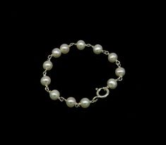 925 sterling silver customized solid silver pearls baby bracelet, excellent gift for new born baby, stylish jewelry from india.Metal-925 sterling silver.Item type-Baby braceletLength-4.5 inches.pearl size-5 mm approx.Weight-3.140 grams.Stamped-925.Makes excellent gift for baby, birthday, Christmas day. Flexible Bracelet, Exotic Jewelry, Adjustable Bangle Bracelet, Baby Pearls, Baby Bracelet, Baby Jewelry, Authentic Jewelry, Natural Pearl, Unisex Jewelry