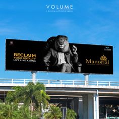 A hoarding designed for Mahagun’s project - Manorial, extending the campaign ‘Reclaim Your Life’, representing the magnificent living through the majesty of lion.    #Branding #creativeagency #advertisingagency #marketingstrategy #creativeadvertising #reflectinggrowth #VOLUME Creative Hoarding Design, Hoarding Design Creative, Real Estate Marketing Plan, Real Estate Banner, Digital Retail, 2024 Board, Real Estate Advertising