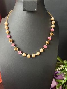 Nakshi Gold Beads/Pink Pumpkin  Beads Mala/19. inches long /Gold Finish Beads Mala Trendy 1 Line Necklace/Only One Haram/Premium Quality. This item is perfect to wear any time parties and festivals! DETAILS: Includes One 1 Line Mala Haram Only One . Necklace: 19. inches. Over Head to Slide Down Weighs 0.80 oz (22g).  Earrings:  Material: Imitation Premium Quality Gold Finish with Pumpkin Beads  Finish: Premium Quilt  gold finish.  NOTE: I try my best to show you photos of my products as they app Pink Polished Bead Necklace For Gift, Pink Polished Beaded Necklaces For Gifts, Pink Necklace With Polished Beads For Gift, Pink Necklaces With Polished Beads For Gifts, Traditional Pink Jewelry With Colorful Beads, Bridal Necklace With Colorful Round Beads, Adjustable Pink Pearl Chain Necklace, Pink Pearl Necklace With Colorful Beads As A Gift, Pink Pearl Beaded Necklace For Gift