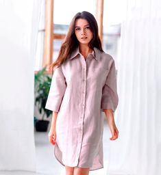 Upgrade your wardrobe with our linen shirt dress for women. This loose knee-length dress features 3/4 kimono sleeves with buttons and a long tunic design that's perfect for casual wear or as loungewear. The blouse dress is intentionally oversized for a relaxed and comfortable fit. The edges of the shirt are slightly rounded, adding a touch of elegance to the overall design, while slits on the sides add to its comfort and flexibility. Made from high-quality linen, this dress is breathable and lightweight, making it ideal for warm weather. Our linen shirt dress is knee-length, making it suitable for both casual and formal occasions. Its versatile design ensures that it can be paired with sandals, sneakers, or heels, and can be dressed up or down. Experience the ultimate comfort and style wit Shirt Dress Knee Length, Knee Length Shirts For Women, Summer Half Sleeve Shirt Dress With Buttons, Daywear Dresses With Roll-up Sleeves, 3/4 Sleeve Shirt Dress For The Beach, Relaxed Fit Half Sleeve Shirt Dress, Summer Workwear Shirt Dress With 3/4 Sleeves, Knee-length Linen Shirt Dress, Summer Dresses With 3/4 Sleeves