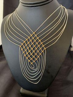 * The Necklace has beautiful Sterling Silver Heishi beads and Gold Filled Beads Cascading down and strung in 7 Strands, With a unique design it adds a Gorgeous Style to the Necklace. * Length 18" drops down to 28" * Strands 7 * Made in USA   Free Returns or Replacements within 30 Days of Purchase with tags intact. Please let us know the problem before posting a bad feedback. Fast, Free and Guaranteed Shipping Please contact seller for any questions and concerns. We hope you have a great experience with us and hope for an awesome review. Luxury Handmade Multi-strand Jewelry, Adjustable Gold Beads Necklace, Luxury Handmade Adjustable Necklace, Unique Multi-strand Jewelry With Spacer Beads, Artisan Gold Necklaces With Spacer Beads, Unique Gold Beaded Necklaces With Spacer Beads, Artisan Gold Necklace With Spacer Beads, Artisan Gold Necklace With Polished Beads, Unique Gold Necklaces With Polished Beads