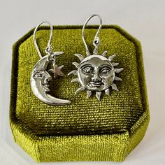 "Celestial Half Moon with dangling star & Sun Dangle Drop Earrings ~ The earrings are SOLID NOT HOLLOW sterling silver.  ERA- 2023 METAL / MATERIAL - Sterling Silver MARKINGS / HISTORY - Earrings are marked 925 CONDITION - New MEASUREMENTS - Earrings: 1 1/2\" x 3/4\"  -Weight (both earrings): 3.42 grams" Celestial Silver Earrings With Star Charm, Celestial Star-shaped Earrings With Sun And Moon Design, Celestial Star Shaped Earrings With Sun And Moon Design, Sun Earring, Sun And Moon Earrings, Star Earring, Celestial Earrings, Retro Accessories, Moon Sun