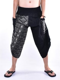 "Harem pants, Yoga pants, Wide leg pants, Trousers, Samurai pants Printed with Black Thai Pattern Design Printed Cotton Samurai pants with Side button is inspired Samurai and Ninja pants from Japan. Created and Designed for Everyone, Wide Leg Designed Easy to Movement, Easy to Wear and Comfy. The Pants is made of 100% Cotton and Printed with beautiful pattern design. The Pants made by Thai Craftsmanship, Attention and Neatness in sewing an item. Cotton Samurai pants has one Pocket in front for s Baggy Black Cotton Harem Pants, Black Baggy Hip-length Bottoms, Black Ankle-length Cotton Pants, Black Wide-leg Cotton Harem Pants, Black Relaxed Fit Ankle-length Capris, Black Cotton Capris With Elastic Waistband, Black Relaxed Fit Wide Leg Capris, Black Wide Leg Relaxed Fit Capris, Casual Black Yoga Bottoms