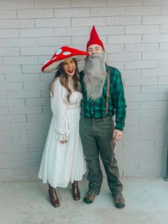 a man and woman dressed up as gnomes