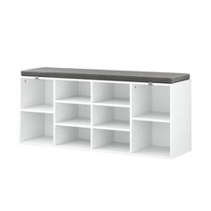 a white shelf with several compartments and a bench top on it's left side