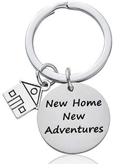 a keychain that says new home, new adventures