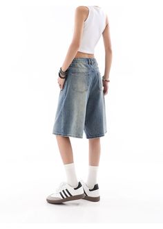 Stay cool and on-trend with our Denim Bermuda Wide-Leg Jean Shorts, a summer wardrobe essential with a retro-chic flair. Crafted for comfort and style, these shorts boast a high-quality denim fabric with a distinctive gradient design and a relaxed fit. Their wide-leg cut provides a breezy, casual look perfect for versatile styling, while the sturdy craftsmanship ensures these shorts are a durable addition to any fashion-forward collection. Whether you're heading to a laid-back brunch or an after Types Of Shorts, Grunge Baggy, Summer Wardrobe Essentials, Gradient Design, Simple Tees, Streetwear Fashion Women, Long Shorts, Retro Chic, Stay Cool