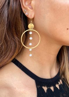 Pearl hoop earrings, gold pearl earrings, bridal earrings, wedding jewelry, freshwater pearls, bohemian jewelry, gold hoops,Art Deco Jewelry Gorgeous All natural freshwater Ivory pearls dangle in 14k gold plated hoops and coin charm with your choice of 14k gold plated ear wire or 14k gold filled ear wire. The perfect Boho Chic piece for a rustic/boho wedding looking.  Simple, Dainty, Delicate, Elegant and Romantic. The picture does not do its justice the piece is so much prettier in person.  Per Gold Brass Hoop Earrings With Pearl Drop, Gold Hoop Earrings With Pearl Drop In Brass, Gold Hoop Earrings With Pearl Chain For Wedding, Wedding Gold Hoop Earrings With Pearl Chain, Brass Hoop Earrings For Wedding, Gold Small Hoop Earrings With Pearl Chain, Gold Hoop Bridal Earrings With Pearl Drop, Round Brass Pearl Earrings For Wedding, Bohemian Gold Pearl Drop Bridal Earrings