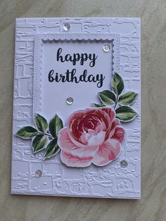 a birthday card with a pink rose on it