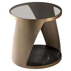 a black and gold side table with a glass top in the shape of a cone