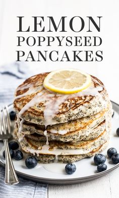 lemon poppy seed pancakes on a plate with blueberries