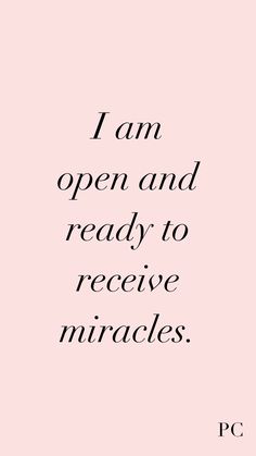 the words i am open and ready to receive miracles on pink background with black lettering