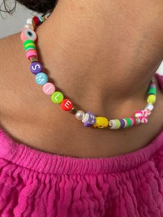 Smile Bright wearing this Preppy style beaded necklace... 13 inches in length  Lobster claw clasp, made with clay beads & positive energy. For more similar jewelry check out my shop: ⬇️ https://www.etsy.com/listing/1593805562/good-vibes-preppy-beaded?click_key=a290780d62f27713a55401852a91e3ce68f3963a%3A1593805562&click_sum=2358c70f&ref=shop_home_active_7&frs=1 Fun Beaded Necklaces With Tiny Beads For Gifts, Adjustable Playful Beaded Necklaces With Tiny Beads, Fun Beaded Necklace With Tiny Beads For Gift, Trendy Colorful Beaded Necklaces With Letter Beads, Trendy Colorful Beaded Necklace With Letter Beads, Fun Beaded Necklaces As Gift, Fun Adjustable Beaded Chain Jewelry, Adjustable Fun Beaded Chain Jewelry, Fun Adjustable Necklace With Letter Beads