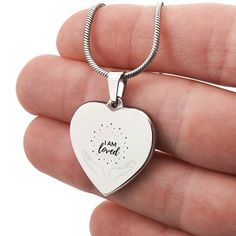 Surprise your loved one by giving them this sweet Engraved Heart Necklace! It's a classic and heartfelt jewelry piece that is sure be treasured. If the custom engraving option is available, you can choose to personalize onto the back of the pendant your loved one's name, a special date, or anything else you want to remember and keep you close to their heart. Each personalized piece offers exceptional craftsmanship that is fit to be an instant classic in your family.The Engraved Heart Necklace is attached to an adjustable snake chain, and made from high quality stainless steel, and is also available in an 18K yellow gold finish option. Product Specifications: Pendant size 0.9" x 0.94" (2.3cm x 2.4cm) 18"-22" Adjustable snake chain Lobster clasp attachment Polished stainless steel or 18K yel I Am Present, Engraved Heart Necklace, I Am Loved, Pearl Love, Message Jewelry, Box Making, Love Affirmations, A Snake, Polished Stainless Steel