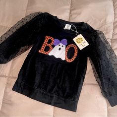 Girls 6y Halloween “Boo” Long Sleeve Shirt. Never Worn Fun Black Top For Halloween, Fun Black Tops For Halloween, Black Long Sleeve T-shirt For Costume Party, Playful Black T-shirt For Fall, Long Sleeve Halloween Shirt, Kids Halloween Shirts, Spooky Long Sleeve Halloween Tops, Oversized Long Sleeve Halloween T-shirt, Fun Long Sleeve Halloween T-shirt