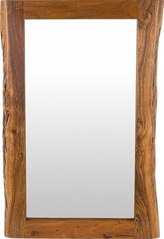 a wooden frame mirror sitting on top of a white wall