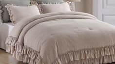 the comforter is made up with ruffles on it's bedding