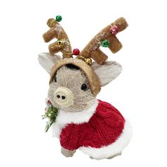 a small stuffed animal wearing a sweater and reindeer antlers on it's head