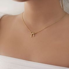 Dainty Ribbon Pendent Necklace  - This listing is for pair os the Dainty Ribbon Pendent Necklace. Perfect for everyday and layering - Length: 16" + 2" extender  - Base Material: High Quality Stainless Steel - Finish: 18K Gold - Nickel Free and Tarnish Free - All our jewelry is packaged in gift ready boxes. If you would like multiple items from your order packaged separately please let us know! © 2024 Generation of Daughters Dainty Gold Pendant, Dainty Everyday Jewelry, Gold Necklace Women Simple, Gold Pendant Jewelry Simple, Pendant Designs Gold Simple, Pendent Necklace Pendants, Gold Necklace Aesthetic, Minimalist Accessories Jewellery, Pendent Gold