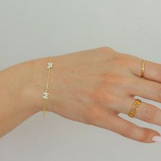 "Butterfly and Letter Bracelet!  Dainty, chic, and compliments any style! Each piece is handmade and crafted in our atelier just for you!  Made from 925 Sterling Silver with options of 14K Gold and Rose Gold Vermeil. Feel free to message me with any questions or for more details! We love hearing from you! :)  Jewelry pouch included with purchase. At Evva's handmade shop we know you'll find something lovely for yourself or to give as a gift to someone special! CURRENT PRODUCTION TIMES All items are handmade and made to order so please check our policies page for the most up to date production and delivery times. If you need it sooner, please send us a message on Etsy, we can prepare your item as fast as possible for your needed date. PACKAGING - If certain pieces are intended as gifts, plea Trendy Adjustable Bracelets With Initials, Minimalist Custom Name Bracelets, Dainty Bracelets With Initials For Personalized Gifts, Trendy Initials Bracelet For Gifts, Minimalist Monogram Bracelet For Everyday, Adjustable Monogram Name Bracelet, Mother's Day Name Bracelet With Initials, Mother's Day Initials Name Bracelet, Dainty Adjustable Name Bracelet With Initials