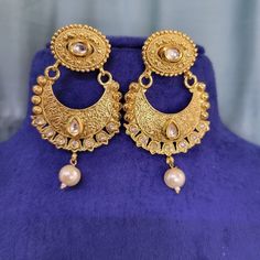 Check out this item in my Etsy shop https://www.etsy.com/listing/1401795281/gold-choker-necklace-gold-necklace Heavy Yellow Gold Bridal Earrings As Gift, Traditional Gold Plated Bridal Earrings, Traditional Kundan Necklace With Matching Earrings, Intricate Kundan Jewelry Sets, Gold Earrings With Elegant Design For Diwali, Formal Bollywood Chandbali Jewelry Sets, Festive Bridal Necklace With Matching Earrings, Heavy Gold Chandbalis, Yellow Gold Chandbalis For Gift