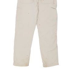 Vintage Carhartt white trousers, fit a 38" waist and 31" inseam. WAIST: 38 inches / 97cmsINSEAM: 31 inches / 79cmsRISE: 11 inches / 28cmsGENDER: mens CONDITION: good - big stains on front and backSTYLE: trousersERA: 1990sCOLOUR: whiteFABRIC: cotton White Utility Full Length Cargo Pants, White Full-length Cotton Cargo Pants, White Cotton Full-length Cargo Pants, White Full Length Cotton Cargo Pants, White Cotton Full Length Cargo Pants, White Utility Full Length Pants, Fitted White Cargo Pants With Cargo Pockets, White Cotton Cargo Pants With Belt Loops, White Tapered Leg Work Pants With Pockets