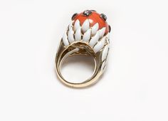 David Webb Ring.Vintage 18K yellow gold, coral round brilliant cut diamond and enamel ring by David Webb. Size 7. Signed David Webb, 18K. David Webb Jewelry Art Deco Enamel Rings For Formal Occasions, Formal Enamel Ring With Gemstone, Formal White Enamel Rings, Art Deco Enamel Ring Jewelry, Art Deco Enamel Jewelry Ring, Vintage Diamond Enamel Round Ring, Vintage Round Diamond Enamel Ring, Fine Jewelry Collectible Enamel Ring, Collectible Enamel Fine Jewelry Ring