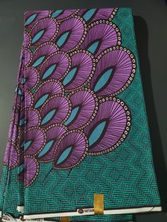 DESCRIPTION Teal and Purple African Ankara Fabric. This is high quality African print is 100% cotton and it's 45 inches wide. It is used for making African Clothing, African quilts, & For Home decoration. FYI: Print is Double sided. The listing is for 2yards, 3yards, 6yards and Headwrap Each piece of fabric measures: 70-72in by 45in for 2yards 105-108in by 45in for 3yards 210-216in by 45in for 6yards 70in by 22in for Head wrap If you purchase more than one yard, you will receive one continuous p Purple African Print, African Quilts, Clean And Press, Head Wrap Headband, Hair Bonnet, African Ankara, Fabric Headbands, Ankara Fabric, Mixing Fabrics