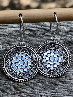 Round Silver Earrings Circle Granulation,Boho Ethnic Earrings Solid Sterling Silver Dangle Intricate Detail,Ancient Design Modern Tribal 925 These Round Silver Earrings Circle Granulation are Boho Ethnic Earrings Solid Sterling Silver Dangle Intricate Detail and Ancient Design Modern Tribal 925 Style Earrings. Truly original and hand done with intricate granulation, these Earrings can fit into many styles and span many fashions. These are classic and very eye catching and beautifully detailed. To achieve this design, each ball of Sterling Silver is applied one at a time, which is called granulation. This is a very time consuming technique all done by hand. These Sterling Silver Earrings are bright silver and 'pop' because of the patina in between each ball of Silver was applied.   The flat Earrings Circle, Ancient Designs, Ethnic Earrings, Style Earrings, Design Modern, Sterling Silver Earrings, Favorite Jewelry, Jewelry Earrings Dangle, Silver Earrings