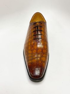 Style: 503-67E-Cognac Unique Crocodile Printed Embossed Calfskin lace-up Oxford from our Carrucci by Maurice collection features soft Calfskin lining, a clean welt, and a Rubber Sole! Lace-up Leather Shoes With Crocodile Pattern, Brown Oxfords With Crocodile Pattern And Round Toe, Brown Leather Shoes With Laces For Business, Brown Leather Shoes With Laces For Formal Occasions, Brown Crocodile Pattern Oxfords With Plain Toe, Brown Crocodile Pattern Leather Shoes For Semi-formal Occasions, Brown Crocodile Pattern Leather Shoes For Semi-formal, Brown Crocodile Pattern Oxfords For Formal Occasions, Brown Crocodile Pattern Formal Oxfords