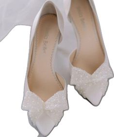 Elegant White Heels For Gala, Elegant Champagne Wedding Shoes With Heel Strap, Elegant White Wedding Shoes For Gala, White Almond Toe Heels For Gala, Elegant Open Toe Bridal Party Accessories, Elegant Champagne Wedding Shoes With Ankle Strap, Elegant 4-inch Heels For Wedding, Elegant White Court Shoes For Party, Elegant White Closed Toe Wedding Shoes