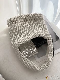 BirdinBag - Compact Perforated Satchel: Effortlessly Stylish White Casual Satchel Hobo Bag, Casual White Bucket Bag For Errands, Trendy White Crochet Shoulder Bag, Casual Textured Shoulder Bag, Trendy White Crochet Bag With Adjustable Strap, Trendy White Crochet Bag For Daily Use, Textured Bags For Everyday Use In Summer, White Open Weave Bag For Daily Use, Casual White Crochet Satchel Bag