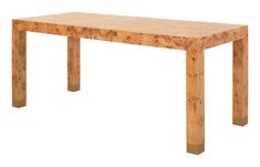 a wooden table sitting on top of a white floor