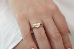 925 Silver/10k/14k/18k Heart Signet Solid Gold Ring/3D Engraved Heart Gold Ring/Handmade Heart Engraved Signet Ring/Engraved Signet Ring Personalized Signet Ring will be handmade with the name you want. I hope this elegant but stylish ring is also a great personalized Birthday Gift and Christmas Gift ---> All of our products are made of high quality 925 Sterling Silver, 10k Gold, 14k Gold and 18k Gold Item Specification --> Material: 925 Sterling Silver, 10k Solid Gold, 14k Solid Gold and 18k So Handmade 14k Gold Heart Jewelry, Classic Heart-shaped Signet Ring For Wedding, Heirloom 14k Gold Heart Promise Ring, Valentine's Day Heirloom Ring Jewelry, Heirloom Style Valentine's Day Jewelry Ring, Valentine's Day Heirloom Ring, Heirloom Heart-shaped Yellow Gold Jewelry, Heart-shaped Signet Ring With Polished Finish For Anniversary, Heart Shaped Signet Ring For Valentine's Day