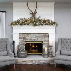 a living room filled with furniture and a fire place in front of a brick fireplace