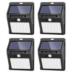 four solar powered motion sensor lights with white leds on each side and the same color