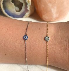 Beautifully light Sterling Silver chain bracelet with Cubic Zirconia Evil Eye charm; adjustable in length up to 7.5 inches  adjustable between 16 - 19.5cm in length  This bracelet is perfect for gifting with our matching necklace & stud earrings also available: Necklace: https://www.etsy.com/uk/listing/727886349/sterling-silver-evil-eye-necklace?ga_search_query=Evil%2Beye&ref=shop_items_search_5 Earrings: https://www.etsy.com/uk/listing/826524760/sterling-silver-evil-eye-earrings?ga_search_query Silver Bracelets Evil Eye, Adjustable Round Cubic Zirconia Chain Bracelet, Dainty Round Jewelry With Adjustable Length, Dainty Jewelry With Adjustable Length, Trendy Gift Jewelry In Cubic Zirconia, Trendy Adjustable Chain Bracelet As Gift, Gift Jewelry With Adjustable Length And Cubic Zirconia, Cubic Zirconia Bracelets With Adjustable Length As A Gift, Cubic Zirconia Bracelets With Adjustable Length For Gifts