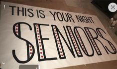 a sign that says, this is your night seniors