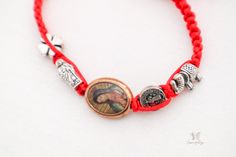 Our Virgencita bracelet is your perfect touch of faith. Wear this bracelet with pride, knowing that you are wearing a piece of our sacred mother. When you feel lost, the best thing to do is pray. When you need guidance, the best thing to do is pray. And when you want a little extra guidance? Wear this bracelet to remind yourself of your faith and the loving energies that surround you. The gold medal is a symbol of Our Lady of Guadalupe, the patron saint of Mexico and this item also features othe Personalized Red Spiritual Bracelets, Red Personalized Spiritual Bracelets, Personalized Spiritual Red Bracelets, Red Personalized Spiritual Jewelry, Personalized Red Spiritual Jewelry, Red Spiritual Personalized Jewelry, Adjustable Red Rosary Bracelet, Red Spiritual Charm Bracelet, Spiritual Our Lady Of Guadalupe Bracelets As Gifts