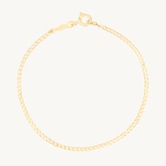 A gold bracelet as shiny and shimmering as a city avenue by day, by night. Looks effortless and cool worn on its own, or in a bracelet stack. A lightweight and semi-hollow chain that's exceedingly easy to wear. An airy, slinky cousin to a classic Cuban chain, made with 14k solid gold, for all the time wear. Gold Curb Chain Bracelets For Everyday, Everyday Gold Bracelets With Curb Chain, Everyday Yellow Gold Name Bracelet With Jubilee Style, Adjustable Yellow Gold Bangle Bracelet, Gold Plated Curb Chain Bracelets For Everyday, Everyday Gold Plated Curb Chain Bracelets, Gold Curb Chain Bracelet For Everyday, Minimalist Gold Plated Curb Chain Bracelets, Yellow Gold Adjustable Bracelet