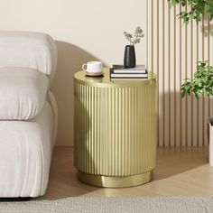 a living room with a couch, chair and coffee cup on the end table next to it