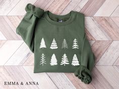 Christmas Tree Sweatshirt *Product Details - Unisex Sweatshirt - Designed with pre-shrunk soft air-jet spun yarn - Features a crew neck - Double-needle stitched collar, shoulders, armholes, cuffs and hem - Loose fit for a comfortable feel *Sizing and Colors - Please refer to sizing and color charts in the images *Fabrication - 50% cotton, 50% polyester *Care Instructions - Turn inside out and machine wash cold on delicate cycle - Dry on low heat setting - Do not bleach - Do not dry clean - Do no Minimal Sweatshirt, Christmas Tree Sweater, Holiday Sweaters, Tree Sweater, Merry Bright Christmas, Christmas Tree Shirt, Winter Shirts, Christmas Outfits, Holiday Sweatshirt