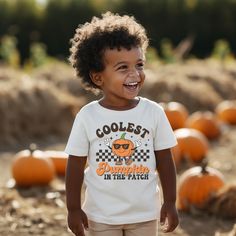 This "Coolest Pumpkin in the Patch" shirt is a perfect tee for the little one in your life! On trend and absolutely adorable - this shirt is a must have for this fall. Our Bella + Canvas tees are made with 100% Airlume combed and ring-spun cotton, a lightweight fabric (4.2 oz/yd² (142 g/m that is easy to layer, breathable. Perfect for active and leisure wear. Our soft, high quality printed tees feel like a well loved favorite from day one. Gift happy to someone in your life with this happy gift! ** HOW TO ORDER ** Select size + color from the drop down menus Add to cart + place order  ** SIZING ** Please refer to sizing charts for accurate measurements.  ** SHIPPING ** Ships in 2-5 business days ** ABOUT OUR SHIRTS ** * Bella Canvas Brand * White, Black, Natural, Pink: 100% Cotton * Athlet Fall Cotton T-shirt With Character Print, Playful School Top For Fall, Playful Cotton Tops For Halloween, Playful Crew Neck T-shirt For Fall, Playful Pre-shrunk T-shirt For Fall, Novelty Cotton Shirt For Fall, Playful Short Sleeve T-shirt For Fall, Playful Short Sleeve Fall T-shirt, Cotton Character Print T-shirt For Fall